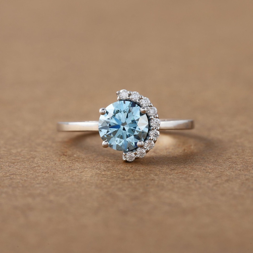 Behold this stunning solitaire ring in a 14kt labgrown diamond radiating beauty and charm