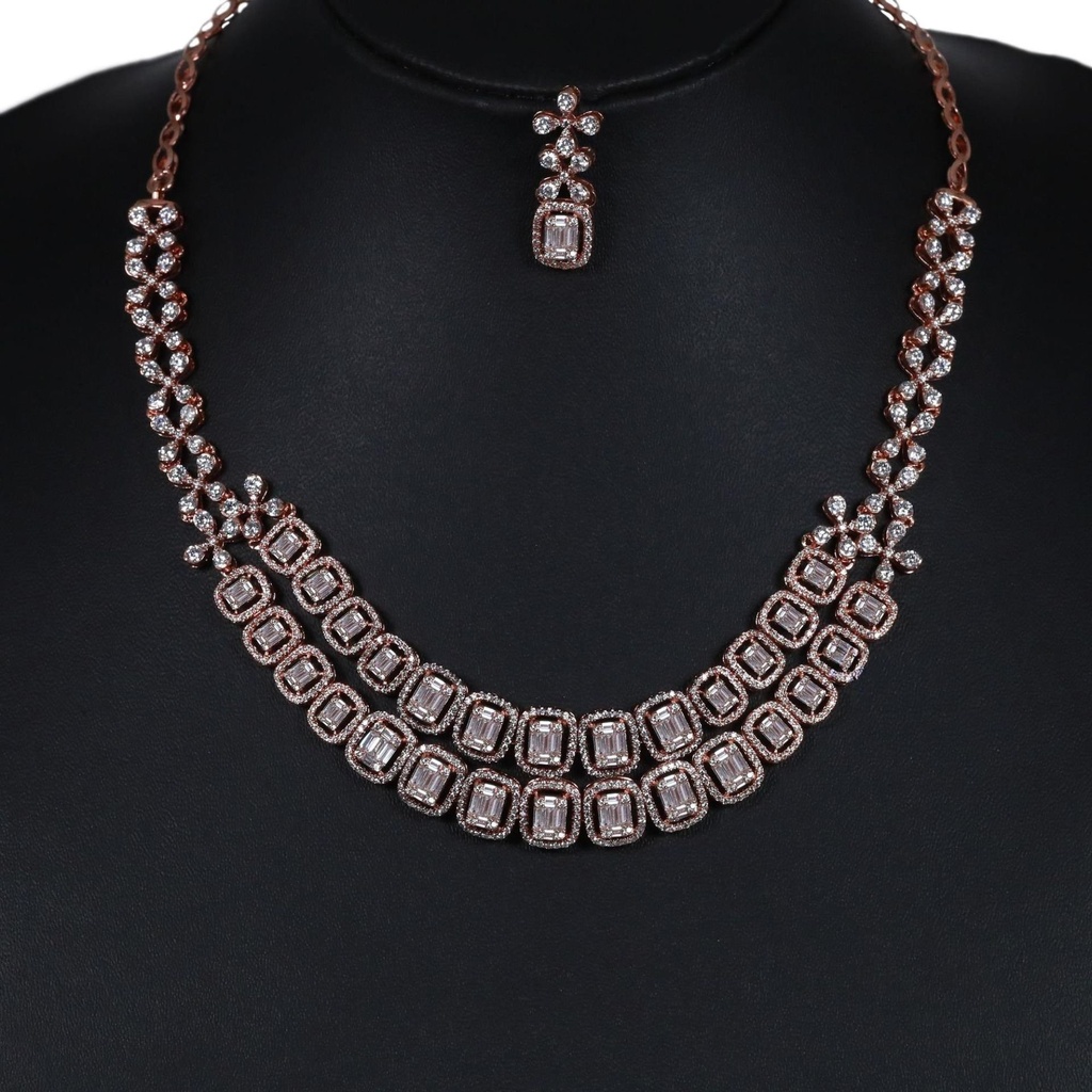 Elevate your neckline accessory in 14 kt rose gold lab grown baguette and round cut diamond necklace
